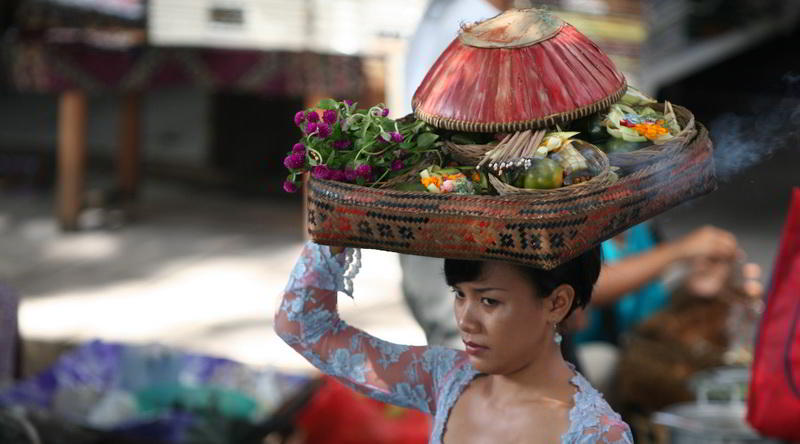 Balinese woman with offerings